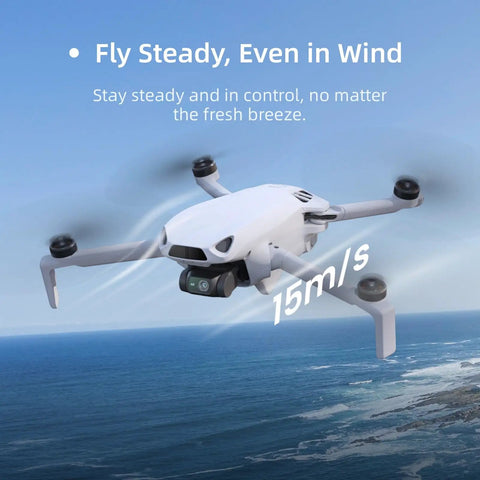 Top Of The Line Mini Drone With Camera Cranking 4K 60fps Smooth Videos And 8K Ultra-Clear Photos flying over ocean, showcasing aerodynamic design.
