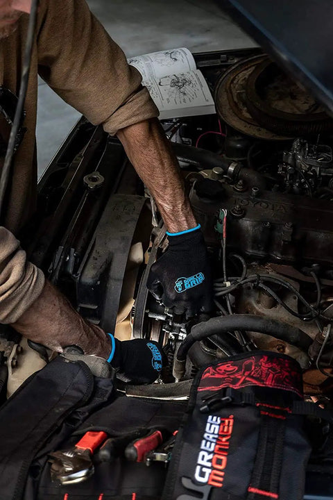Mechanic wearing 5 Pack Heavy Duty Work Gloves Large Size With Never Slip Grip Nylon Dipped Coating working on car engine