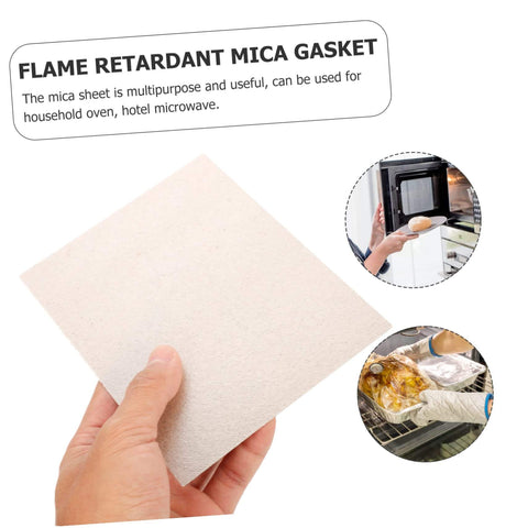 Hand holding a mica plate sheet for microwave oven use, highlighting heat insulation and flame retardant properties.