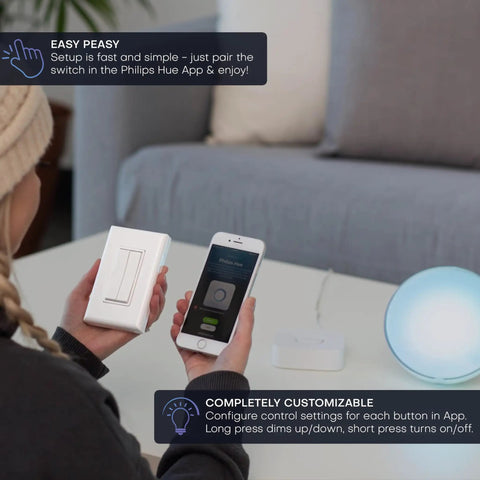 Person pairing Click For Philips Hue No Battery Needed Wireless Light Switch 3 Pack With 30 Foot Range to smartphone app