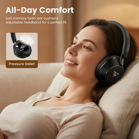 Woman relaxing wearing over ear studio monitor headphones for recording and mixing, closed back, 50mm drivers, dual jacks.