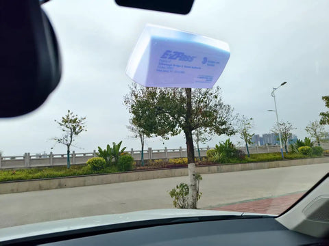 Rock Solid Transponder Mounting Strips For Windshield Toll Tags Heavy Duty Dual Lock Tape installed on car windshield.
