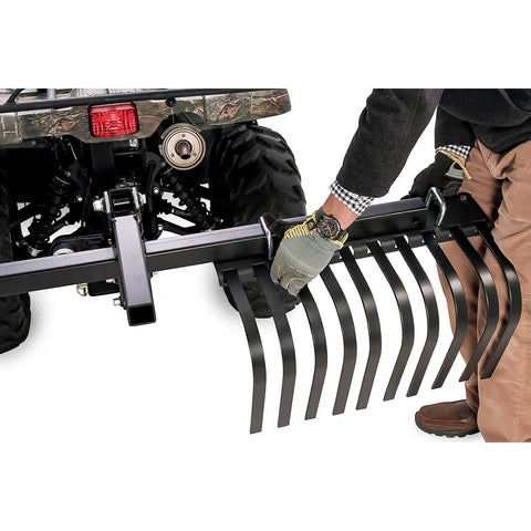 Heavy Duty ATV UTV Landscape Rake For Rock Debris Removal, man attaching rake with removable tines to an ATV.
