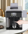 Dual Action Countertop Ice Maker And On Tap Cold Water Dispenser With Smooth Lcd Controls For Rapid Bullet Cube Crafting in use.