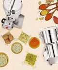 800G High Speed Electric Stainless Steel Grain Grinder And Pro Grade Crusher with dried food, nuts, and spices around