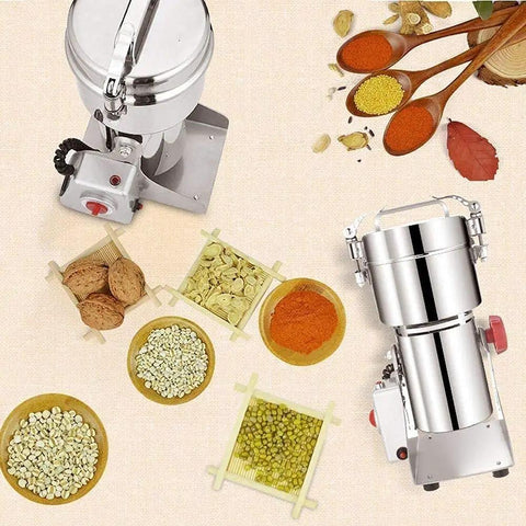 800G High Speed Electric Stainless Steel Grain Grinder And Pro Grade Crusher with dried food, nuts, and spices around