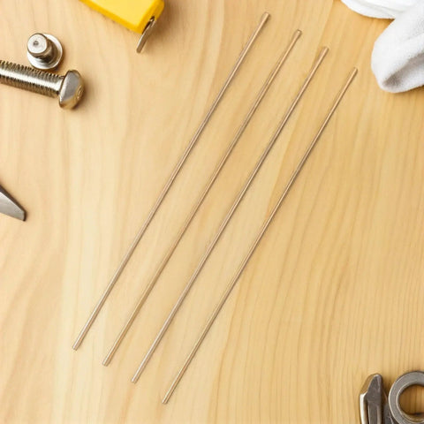 Four brass round dowels on wood surface, for DIY knife handle kits, Two Brass Knife Pins For DIY Knife Handle Kits And Repairs