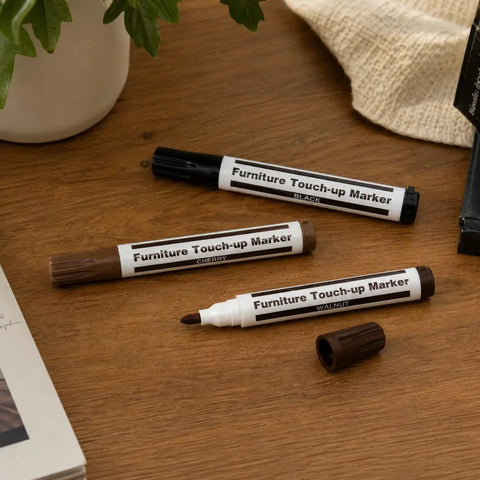 Deliver A No Sweat Slick Finish With This Elite Furniture Fix Kit Featuring Three Premium Wood Touch Up Markers In Rich Black Cherry Walnut Tones To Knock Out Stubborn Scratches And Freshen Up Floors Or Cabinets Fast. Three furniture touch-up markers in black, cherry, and walnut on wooden surface.