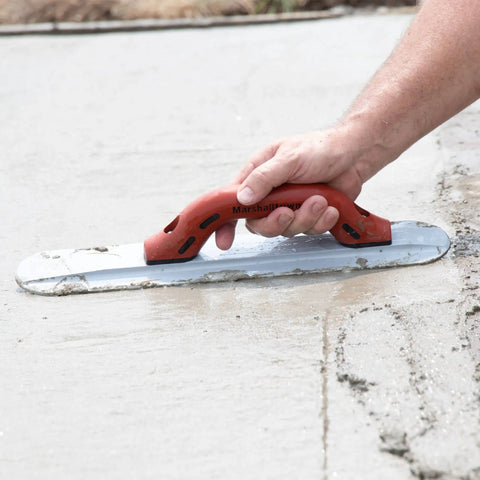 Person using Round End Magnesium Hand Float For Concrete Finishing With DuraSoft Handle, Pro Grade Lightweight Magnesium Blade.