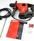 Beast 120V Rotary Hammer Drill Kit TE 7-C With D-Grip, including cord, manual, and accessories, ergonomic and heavy-duty design