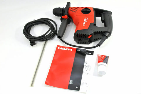 Beast 120V Rotary Hammer Drill Kit TE 7-C With D-Grip, including cord, manual, and accessories, ergonomic and heavy-duty design