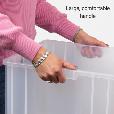 Person holding Stak-N-Store Stackable Storage Bins 2-Pack Heavy Duty Open Front Plastic Organizer For Tools Shelves