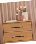 Wood dresser with Aluminum Alloy Drawer Handles And Cabinet Pulls Kit in black finish, featuring modern floral decor on top.