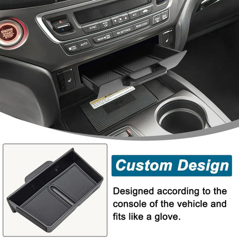 Close-up of black removable center console tray organizer in Honda Pilot dashboard cubby with custom design information.