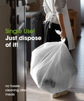 Person disposing of a large white trash bag, showcasing easy cleanup with No Drama Cleanup Disposable Plastic Tablecloths Rectangle Table Cover 54X108 Inches White 10 Pack Heavy Duty Waterproof For Backyard Cookouts Folding Buffets And Weekend Hangouts Proven Reliable.
