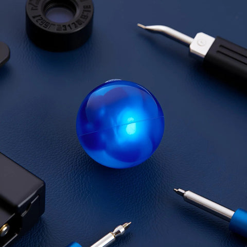 Blue Rubber Ball Watch Case Back Opener For Battery Replacement on blue surface with tool accessories