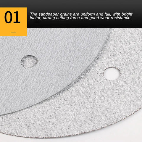 Close-up of Heavy Duty 225mm Hook And Loop Sanding Discs Pack Of 100 Pieces for Drywall Sander with six holes.