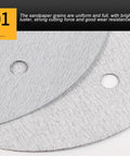 225 Millimeter Hook And Loop Sanding Discs featuring uniform alumina grains and 6 holes for efficient drywall sanding.