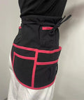 Side view of a Heavy Duty Workhorse Sewing Organizer Belt With Industrial Stitching And Multipocket Tailoring Girdle, black with pink accents.