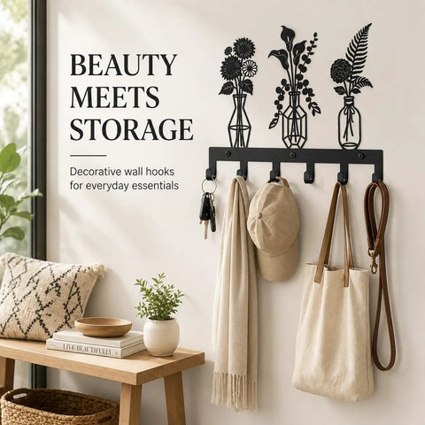 Knockout Premium Decorative Floral Metal Wall Coat Rack Featuring Six Heavy Duty Hooks And Matte Black Finish for everyday uses, displaying hats and keys.