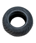 13x5.00-6 Tubeless Pneumatic Go Kart Tire For Front Or Rear Wheels, Deep Tread Grip, shown from side angle.
