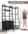 Garage Sports Equipment Organizer With Beefy Heavy Duty Ball Holder, Golf Bag Storage Rack, standing next to child for scale.