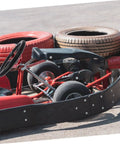 Universal 14 Inch PU Racing Steering Wheel With Horn Button Red Drift Style on gokart with tire barriers in background