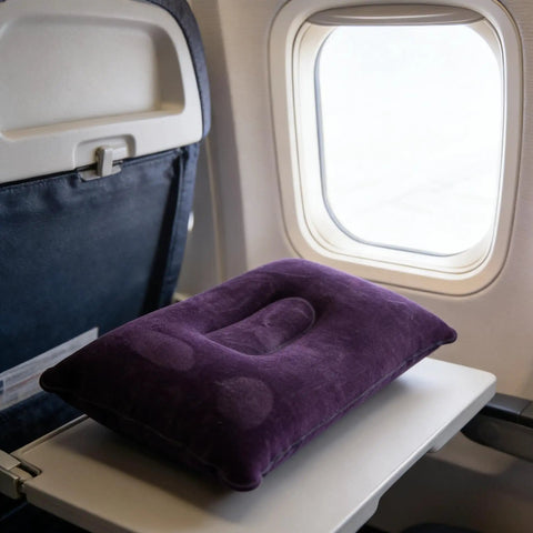Inflatable Neck And Lumbar Support Travel Pillow For Office Car Camping Hiking And Naps Dark Blue Color Super Cozy Yet Firm Easy To Inflate Adjustable Firmness Lightweight And Portable For All Day Comfort On The Go on airplane tray table.
