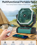 Person using remote to control Beast Mode Portable Rechargeable Camping Fan With 9 Inch Blade 24000mAh Battery on table