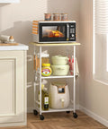 White Rolling Kitchen Microwave Cart With 3 Tier Stand And Adjustable Shelf On Wheels in a corner kitchen setup.