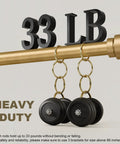 Gold curtain rod holding 33 LB weights, showcasing heavy-duty capacity for Modern Gold Curtain Rod Set Of 2 With 1 Inch Diameter Heavy Duty