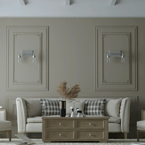 Two-Light Vanity Light With Clear Ribbed Glass Shades And Nickel Finish mounted on a beige living room wall