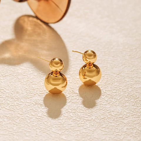 Gold Double Ball Drop Earrings For Women Round Ball Bead Dangle Studs Trendy Jewelry Must Have Hypoallergenic Lightweight Everyday Wear Gift Idea Classic Yet Modern Gold Tone Accessories, front view