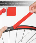 Hands applying red PVC rim tape for 700C 27 inch bike wheels, rim liner strip to protect inner tube and prevent flats.