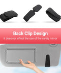Heavy Duty Magnetic Sunglass Holder For Car Sun Visor With Secure Snap Clip And Soft Leather Wrap one-handed clip design displayed on car visor.