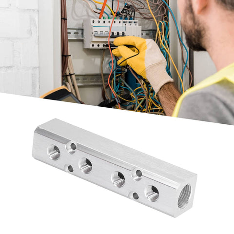 Heavy Duty Aluminum Pneumatic Manifold Block With G1/2 Inlet And G1/4 Outlet against a factory electrical junction background.