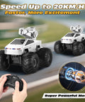 Amphibious RC Car With Water Cannon And Waterproof Remote Scale One To Sixteen 4WD Monster Truck racing on track