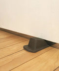 Heavy Duty Rubber Door Wedge 2 Pack Brown Non Marking Grip Lip For Hard Floors Carpets And Outdoor Surfaces Keeps Doors From Swinging And Scratching Walls.