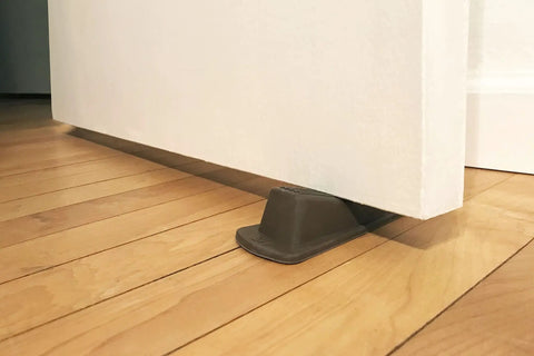 Heavy Duty Rubber Door Wedge 2 Pack Brown Non Marking Grip Lip For Hard Floors Carpets And Outdoor Surfaces Keeps Doors From Swinging And Scratching Walls.