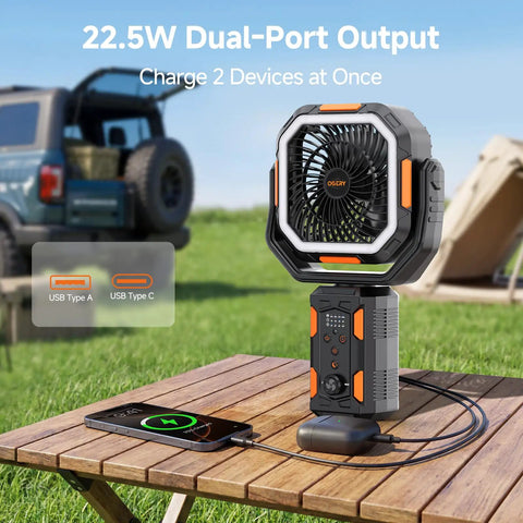 Portable Camping Fan With Adjustable Height Stand 20000mAh Rechargeable Battery Remote LED Light on outdoor table.