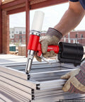 Heavy Duty Pneumatic Rivet Gun Kit With Five Jaw Sets For Quick Fastening Hella Durable Air Riveter in use on aluminum sheets.