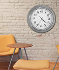 Wall-mounted Clock Insert Kit 1-7/16 Inch Dial Fits 1-3/8 Inch Hole with white dial, black Arabic numerals, in a cozy room setting.