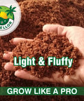 Hand holding fluffy growing medium from Four 1.25 Lb Coco Coir Bricks Expand To Nine Gallons, Ultra-Pure No-Rinse Seed Starter Mix