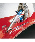 Expert Hand Nibbler For Metal Sheets And Plastic, 250 mm Cutting Capacity, making clean cuts on red metal surface, slip guard handles visible.