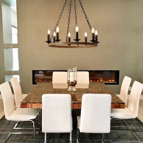 Dining room with Eight-Light Farmhouse Wagon Wheel Chandelier, 26-Inch Industrial Round Candelabra Pendant Light Fixture overhead.