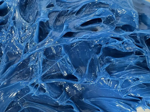 Blue lithium complex grease, multipurpose lubricant NLGI 2 EP high temperature, close-up texture, automotive construction use