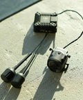 O4 Air Unit Pro FPV Drone Digital Transmission System with 15ms Latency, featuring compact components on concrete surface.