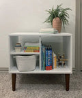 White cabinet with 12 inch round solid wood furniture legs set of 4 for mid century modern style, books and decor on top