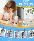 Dope Kids Instant Print Camera With 32GB Card Includes 4 Photo Paper Rolls Color Photos Stored On Memory Card 6 Scene Filters 28 Photo Frames Safe Thermal Print Tech Perfect Birthday Gift For Boys And Girls Ages 3 4 5 6 7 8 9 10 girl decorating printed photos at table
