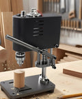 Compact bench drill press for wood and metal work with a reliable copper motor and seven speed switches, ideal for precise drilling.
